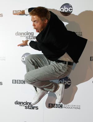 Professional dancer Derek Hough jumps on the red carpet at the 200th Episode Celebration of  ABC's 'Dancing with the Stars' in Hollywood, California. (REUTERS)