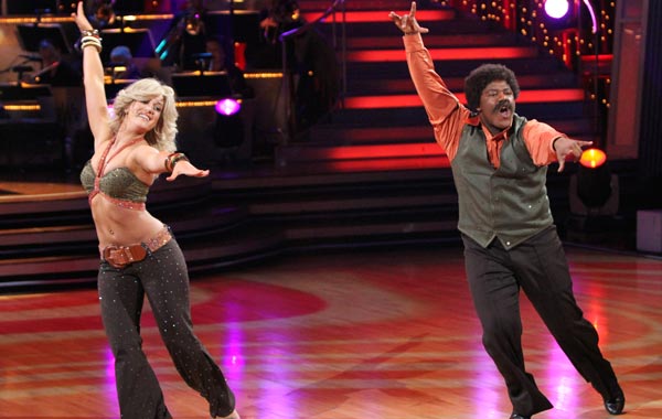 Kyle Massey, right, and his partner Lacey Schwimmer perform during the celebrity dance competition series "Dancing with the Stars,". (AP)