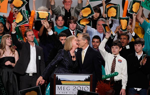 California Republican gubernatorial candidate Meg Whitman gets a kiss from her husband Griff Harsh after delivering her concession speech during her election night rally in Los Angeles, California. (REUTERS)