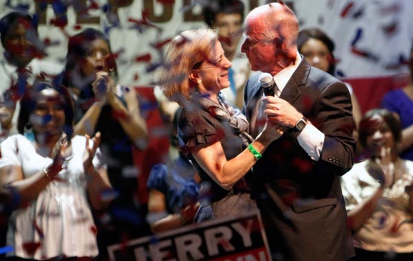 Democratic candidate for California Governor Jerry Brown celebrates his victory over Republican challenger Meg Whitman, with his wife wife Anne Gust Brown, as confetti drops at his election night rally in Oakland, California. (REUTERS)