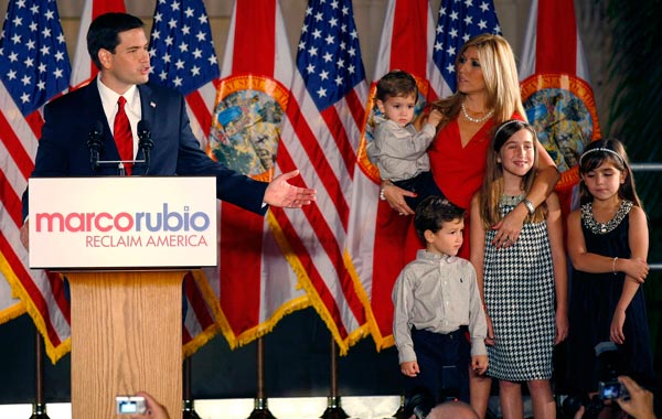 U.S. Republican Senate candidate Marco Rubio (L) stands with his wife Jeanette (R) and their children R-L: Daniella, Amanda, Anthony and Dominic during his victory speech at a rally in Coral Gables, Florida. (REUTERS)