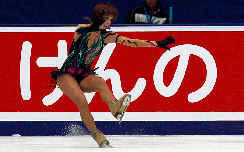 Alena Leonova of Russia falls during her routine in the women's free skate programme at the ISU Grand Prix of Figure Skating competition in Beijing on Saturday. (REUTERS)