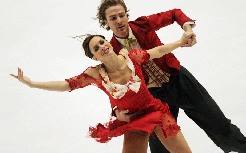 Nathalie Pechalat and Fabian Bourzat of France perform their pair's ice dance free dance programme during the ISU Grand Prix of Figure Skating 2010/2011 in Beijing on Saturday. Pechalat and Bourzat scored a combined total of 159.9 to take first place. (AFP)