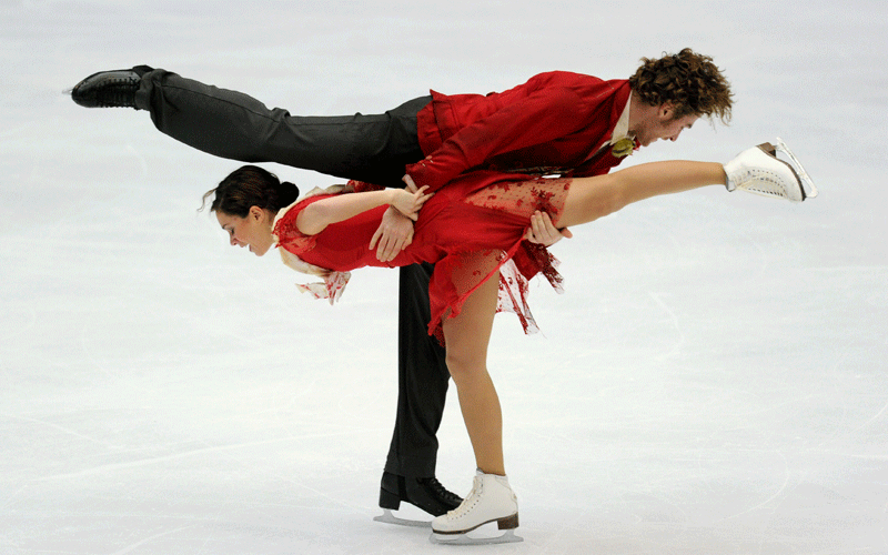 Nathalie Pechalat and Fabian Bourzat of France perform their pair's ice dance free dance programme during the ISU Grand Prix of Figure Skating 2010/2011 in Beijing on Saturday. Pechalat and Bourzat scored a combined total of 159.9 to take first place. (AFP)