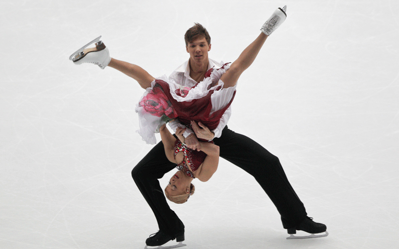 Russia's Ekaterina Bobrova and Dmitri Soloviev perform in free dance during the Cup of China figure skating competition in Beijing on Saturday. (AP)
