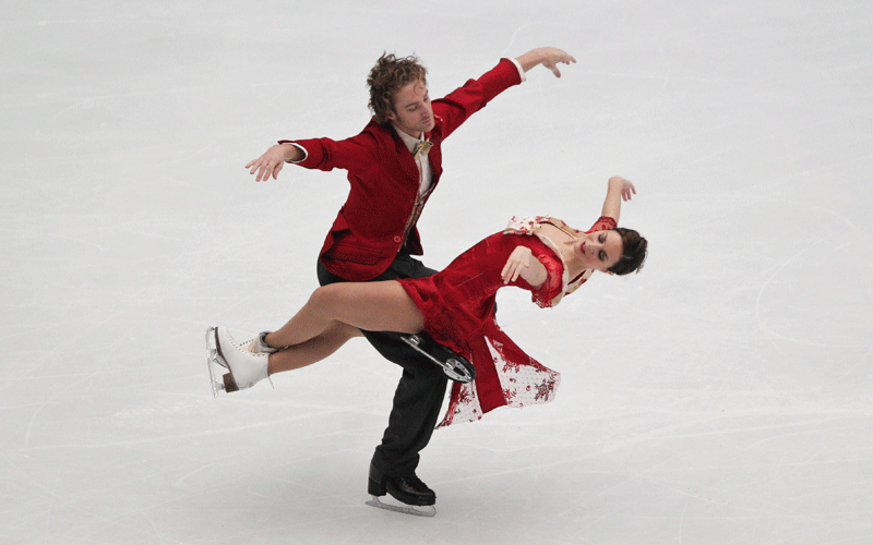 France's Nathalie Pechalat and Fabian Bourzat perform in free dance during the Cup of China figure skating competition in Beijing on Saturday. (AP)
