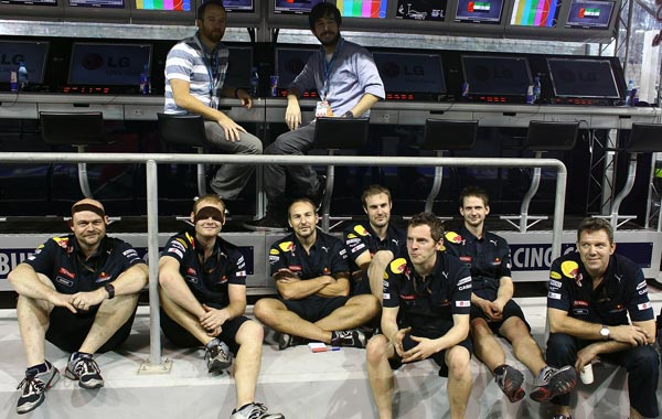 American rock band Linkin Park meets Red Bull Racing team mechanics after qualifying for the Abu Dhabi Formula One Grand Prix at the Yas Marina Circuit. (GETTY)