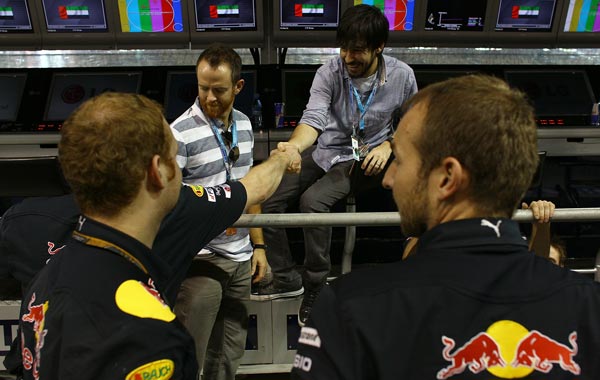 American rock band Linkin Park meets Red Bull Racing team mechanics after qualifying for the Abu Dhabi Formula One Grand Prix at the Yas Marina Circuit. (GETTY)