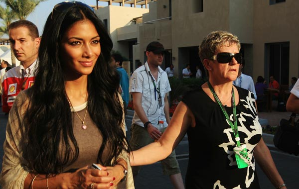Nicole Scherzinger, girlfriend of Lewis Hamilton of Great Britain and McLaren Mercedes and his mother Carmen Lockhart attend qualifying for the Abu Dhabi Formula One Grand Prix at the Yas Marina Circuit. (GETTY)