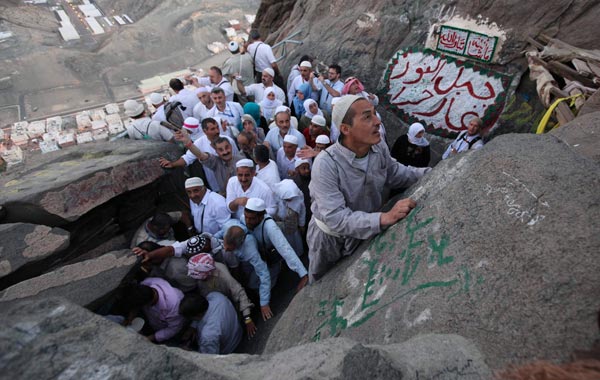 Muslim pilgrims make their way to Hera cave on Mount Al-Noor during the annual haj pilgrimage in Mecca November 11, 2010. The haj is one of the world's biggest displays of mass religious devotion and a duty for Muslims who can perform it. (REUTERS)