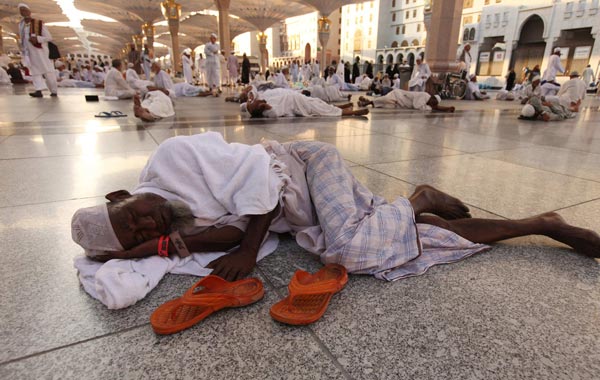 A Muslim man sleeps in Mohammed Mosque during the annual Haj pilgrimage ahead of Eid al-Adha in the Saudi holy city of Madina. (REUTERS)