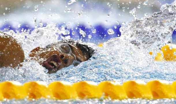 Rohit Havaldar of India competes in his men's 200m freestyle heat at the 16th Asian Games in Guangzhou, Guangdong province. (REUTERS)