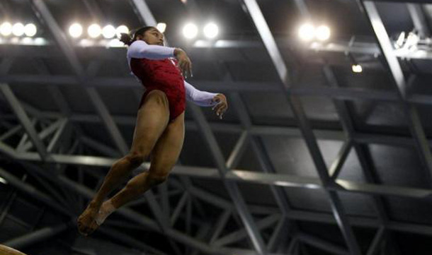 India's Dipa Karmakar performs a routine in the women's vault final during artistic gymnastics at the 16th Asian Games in Guangzhou, Guangdong province. Tanaka got the silver medal. (REUTERS)