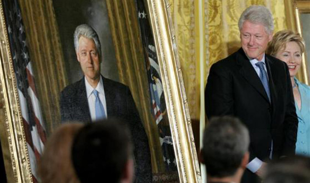 Former President Bill Clinton and his wife Senator Hillary Rodham Clinton at the unveiling ceremony of hi presidential portrait in the East Room of the White House. (REUTERS)