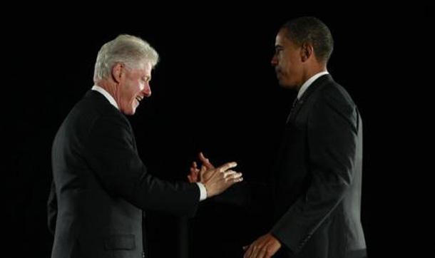 Then Democratic Presidential nominee Senator Barack Obama and former President Bill Clinton shake hands during a campaign rally in Kissimme, Florida. (REUTERS)