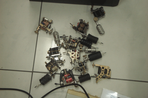 Drills and other tools seized from the illegal tattoo parlour. (SUPPLIED)