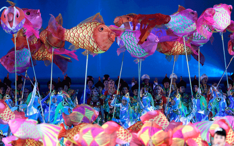 Artists perform during the closing ceremony of the 16th Asian Games in Guangzhou, China. (AP)