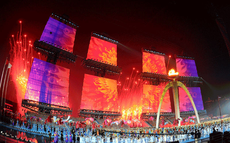 Performers dance during the closing ceremony for the 16th Asian Games in Guangzhou. An "extraordinary" Asian Games prepared to close after 15 days of thrills and spills that saw China reinforce its sporting credentials and Japan slip further behind. (AFP)