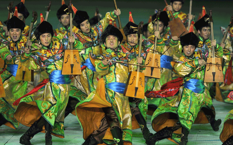Performers dance on stage during the closing ceremony for the 16th Asian Games in Guangzhou. An "extraordinary" Asian Games prepared to close after 15 days of thrills and spills that saw China reinforce its sporting credentials and Japan slip further behind. (AFP)