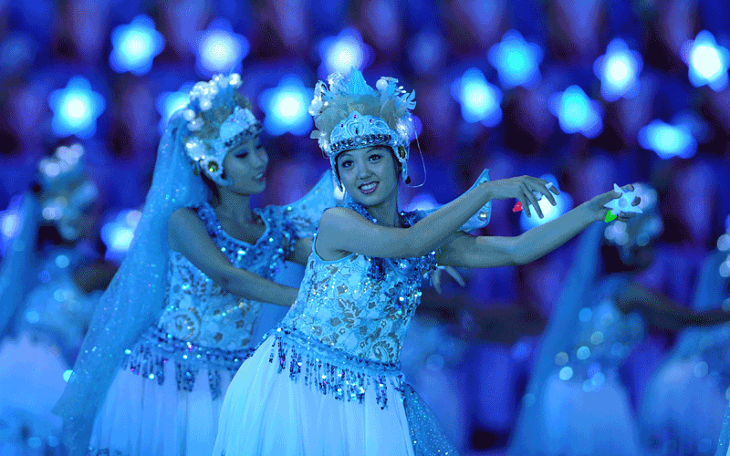 Performers dance during the closing ceremony for the 16th Asian Games in Guangzhou. An "extraordinary" Asian Games prepared to close after 15 days of thrills and spills that saw China reinforce its sporting credentials and Japan slip further behind. (AFP)