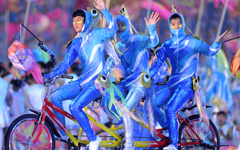 Artists perform during the closing ceremony for the 16th Asian Games in Guangzhou. An "extraordinary" Asian Games prepared to close after 15 days of thrills and spills that saw China reinforce its sporting credentials and Japan slip further behind. (AFP)