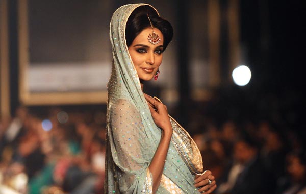 A models displays creations of Pakistani designer Nomi Ansari during a Bridal Couture Week 2010 in Lahore. (AFP)