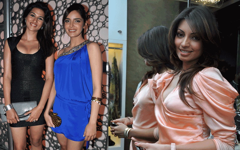 Indian actress Shazahn Padamsee (right), Shraddha Das (left) and Shama Sikandar pose as they arrive for the premiere of Indian bollywood director Madhur Bhandarkar&rsquo;s romantic comedy "Dil Toh Baccha Hai Ji" in Mumbai. (AFP)