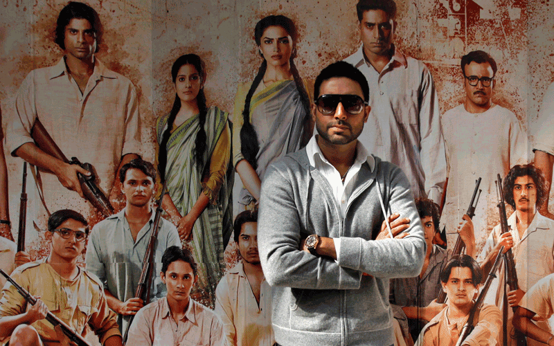 Bollywood actor Abhishek Bachchan poses in the backdrop of film poster during a press conference to promote his new film OKhelein Hum Je Jaan Sey," in New Delhi, India, Monday. The film will release on Dec. 3. (AP)