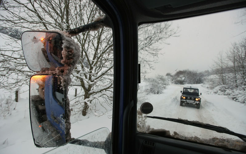 Tayside Contracts plough driver Iain Beedie clears rural roads in Perthshire on December 3, 2010 in Perth, Scotland. After heavy snowfall across the country resulting in severe disruption to Britain's infrastructure the country is now gripped by freezing temperatures.  (GETTY IMAGES)