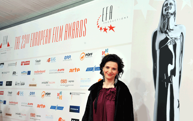 French Actress Julliette Binoche poses on the red carpet during the 23rd European Film Awards ceremony in Tallinn. (AFP)