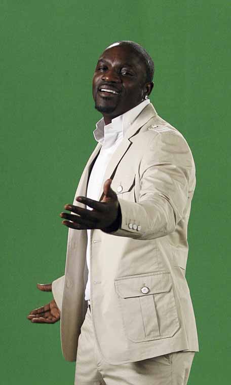 Akon performs during a music video filming for the English-Hindi album 'One for the World' in Mumbai on December 8. While he was in India's financial capital, he also laid down a track for Shah Rukh Khan's 'Ra.One' (AFP)