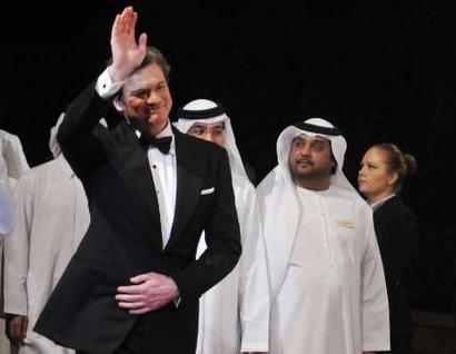 British actor Colin Firth, star of the opening gala 'The King's Speech', interacted with fans and press on the red carpet at the opening ceremony of the Dubai International Film Festival 2010 (REUTERS)