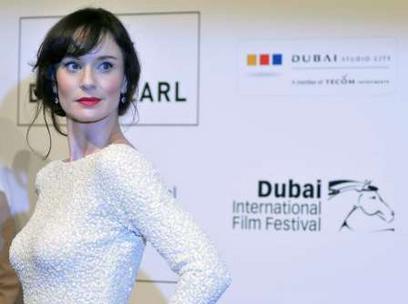 'The Walking Dead' star Sarah Wayne Callies poses on the red carpet for the opening ceremony of the seventh edition of the Dubai International Film Festival on Sunday (REUTERS)