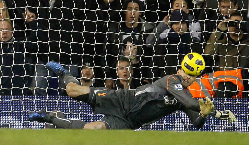 Tottenham Hotspur’s Heurelho Gomes saves a penalty kick from Chelsea’s  Didier Drogba during their English Premiership match at White Hart Lane stadium in London on Sunday. (AP)
