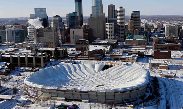 The collapsed roof of the Metrodome is shown in this aerial view  in Minneapolis. The inflatable roof of the Metrodome collapsed Sunday after a snowstorm that dumped 17 inches on Minneapolis. No one was hurt, but the roof failure sent the NFL scrambling to find a new venue for the Vikings' game against the New York Giants. (AP)