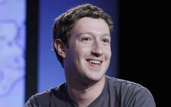 In this November 16 file photo, Facebook CEO Mark Zuckerberg smiles as he speaks at the Web 2.0 Summit in San Francisco. Zuckerberg has been named Time magazine's "Person of the Year" for 2010 .(AP)