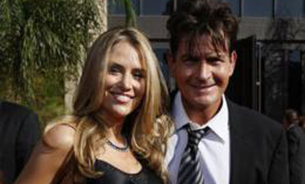 Charlie Sheen and Brooke Mueller walk the red carpet at the 59th Primetime Emmy Awards in Los Angeles, California. (REUTERS)