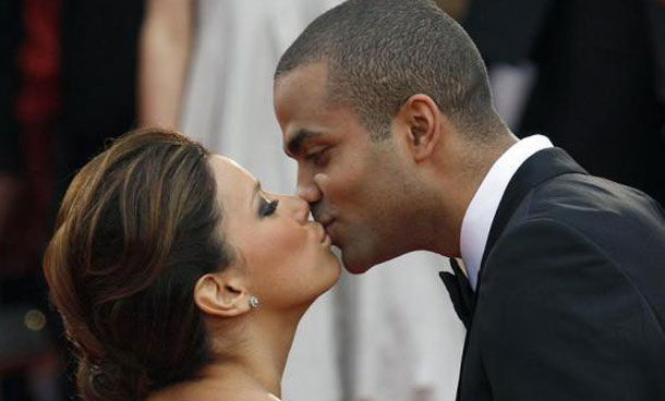 Actress Eva Longoria Parker of the series "Desperate Housewives" kisses hTony Parker (R) as they arrive for the screening of the film "Bright Star" by director Jane Campion at the 62nd Cannes Film Festival. (REUTERS)