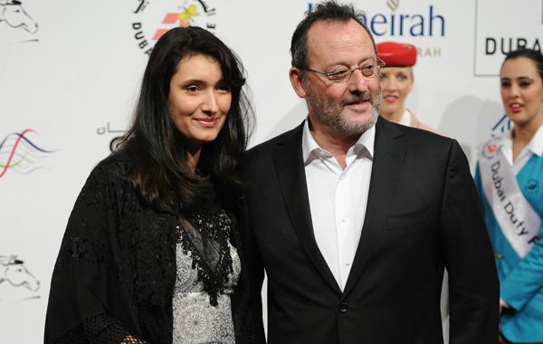 Actor Jean Reno with his wife Zofia Borucka attend "The Philosopher" premiere during day six of the 7th Annual Dubai International Film Festival held at the Madinat Jumeriah Complex. (GETTY)