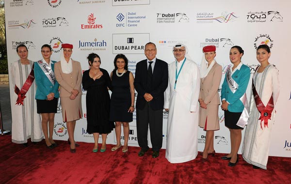 Managing Director of DIFF Shivani Pandya (fifth left), director Andrei Konchalovsky (C) and artistic director of DIFF Masoud Amralla Al Ali (fourth right) attend "The Nutcracker in 3D" premiere during day six of the 7th Annual Dubai International Film Festival held at the Madinat Jumeriah Complex. (GETTY)