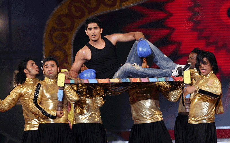 Indian boxer Vijendra Singh performs on the stage of "Big Star Entertainment Awards" ceremony in Mumbai. (AFP)
