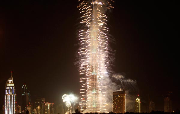 Fireworks explode over Burj Khalifa, the tallest building in the world, celebrating the new year in Dubai. (REUTERS)