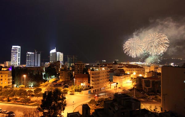 New Year's fireworks explode at midnight over Beirut, Lebanon. The Lebanese capital celebrated the new year with various fireworks displays throughout the city. (AP)