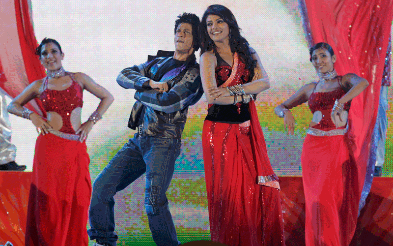 Bollywood actors Shah Rukh Khan and Priyanka Chopra perform at a show after the Twenty20 cricket match between South Africa and India at Moses Mabhida Stadium in Durban. (REUTERS)