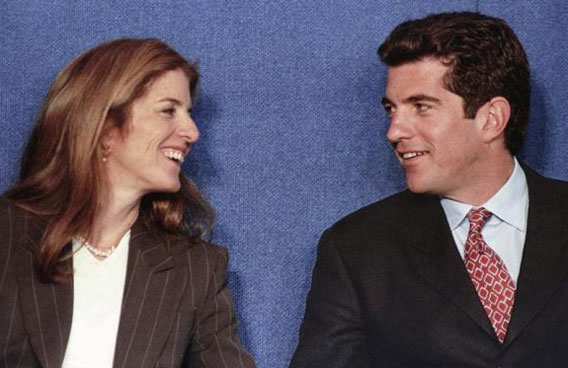 Caroline Kennedy Schlossberg and her brother John F. Kennedy Jr. share a laugh as they chat onstage at the 1998 John F. Kennedy Profiles in Courage Award ceremony at the JFK Presidential Library in Boston, May 29, 1998. (REUTERS)
