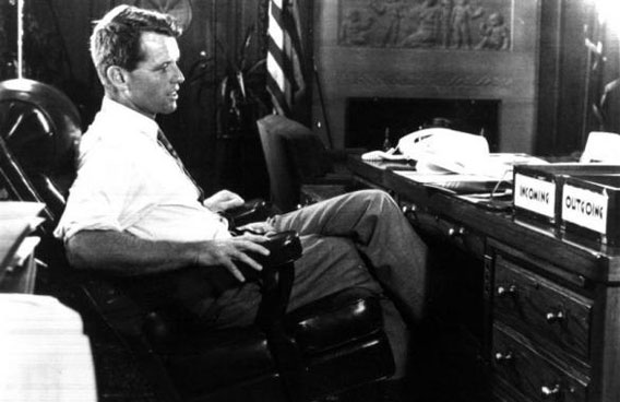 Attorney General Robert F. Kennedy sits at his desk at the Justice Department in 1968. (REUTERS)