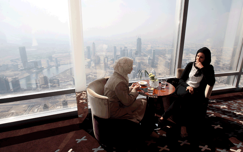 Living the high life: consumers wait to be served at the opening of At.mosphere, the world's highest restaurant at Dubai's Burj Khalifa on January 23, 2011 (Patrick Castillo)