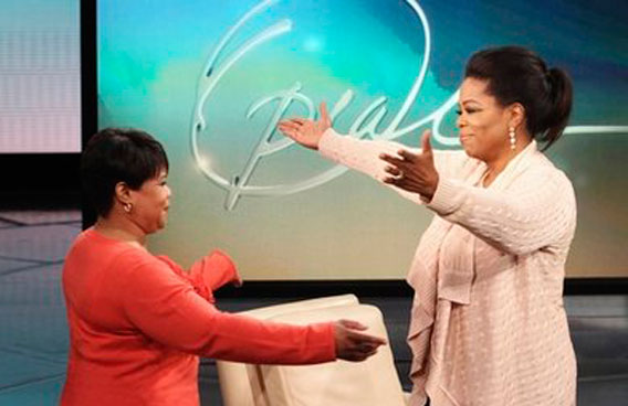 Talk-show host Oprah Winfrey greeting her half-sister Patricia on an episode of 'The Oprah Winfrey Show' taped at Harpo Studios in Chicago. On the show that aired a sometimes-emotional Winfrey introduced Patricia, explaining how the woman's years-long search for her family culminated in a meeting with Winfrey on Thanksgiving Day of last year. (AP)