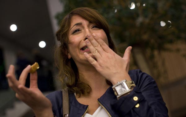 A participant in the lecture, Duygu Tatar, reacts after eating an insect snack (meal worm quiche) during a break in the lecture given by Professor Arnold van Huis at the University of Wageningen January 12, 2011. All you need to do to save the rainforest, improve your diet, better your health, cut global carbon emissions and slash your food budget is eat bugs. Mealworm quiche, grasshopper springrolls and cuisine made from other creepy crawlies is the answer to the global food crisis, shrinking land and water resources and climate-changing carbon emissions, Dutch scientist Arnold van Huis says. To attract more insect-eaters, Van Huis and his team of scientists at Wageningen have worked with a local cooking school to produce a cookbook and suitable recipes. (REUTERS)