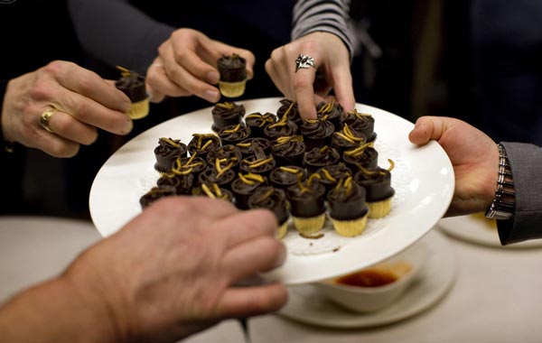 People try an insect snack (meal worm pralines) during a break in the lecture given by Professor Arnold van Huis at the University of Wageningen January 12, 2011. All you need to do to save the rainforest, improve your diet, better your health, cut global carbon emissions and slash your food budget is eat bugs. Mealworm quiche, grasshopper springrolls and cuisine made from other creepy crawlies is the answer to the global food crisis, shrinking land and water resources and climate-changing carbon emissions, Dutch scientist Arnold van Huis says. To attract more insect-eaters, Van Huis and his team of scientists at Wageningen have worked with a local cooking school to produce a cookbook and suitable recipes. (REUTERS)
